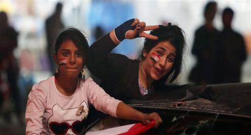 بالصور.. العراقيون يخرجون إلى الشوارع احتفالاً بالتأهل لنهائيات آسيا